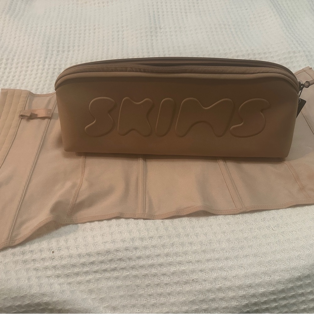 SKIMS Brown Embossed Pouch